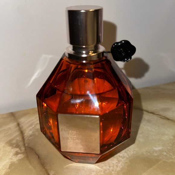 Viktor & Rolf Other - Flowerbomb Tiger Lily Eau de Parfum 3.4 oz Used a few times! I don’t like it.